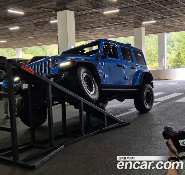 JEEP 랭글러 (JL) 2.0 오버랜드 파워 탑 4도어 4xe 2021 - photo 13 - Import Corée du Sud | International Cars