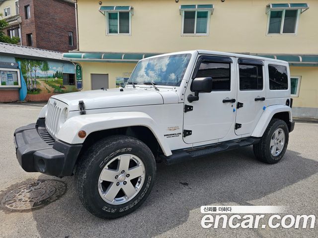 JEEP 랭글러 (JK) 2.8 디젤 사하라 4도어 2012 - photo 2 - Import Corée du Sud | International Cars