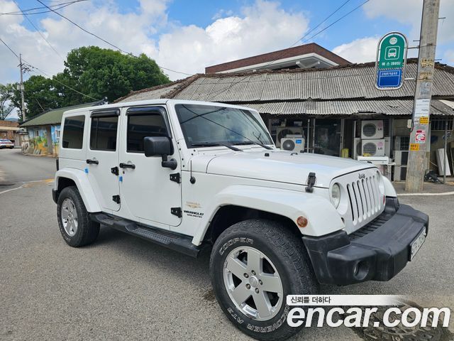 JEEP 랭글러 (JK) 2.8 디젤 사하라 4도어 2012 - photo 3 - Import Corée du Sud | International Cars