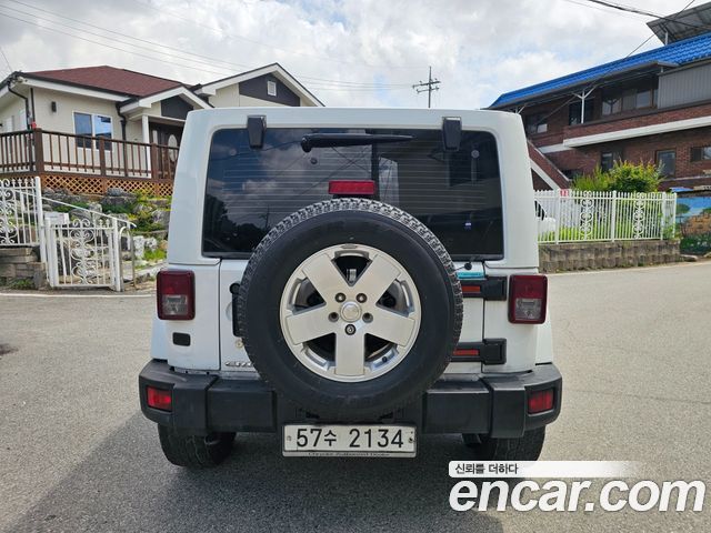 JEEP 랭글러 (JK) 2.8 디젤 사하라 4도어 2012 - photo 5 - Import Corée du Sud | International Cars